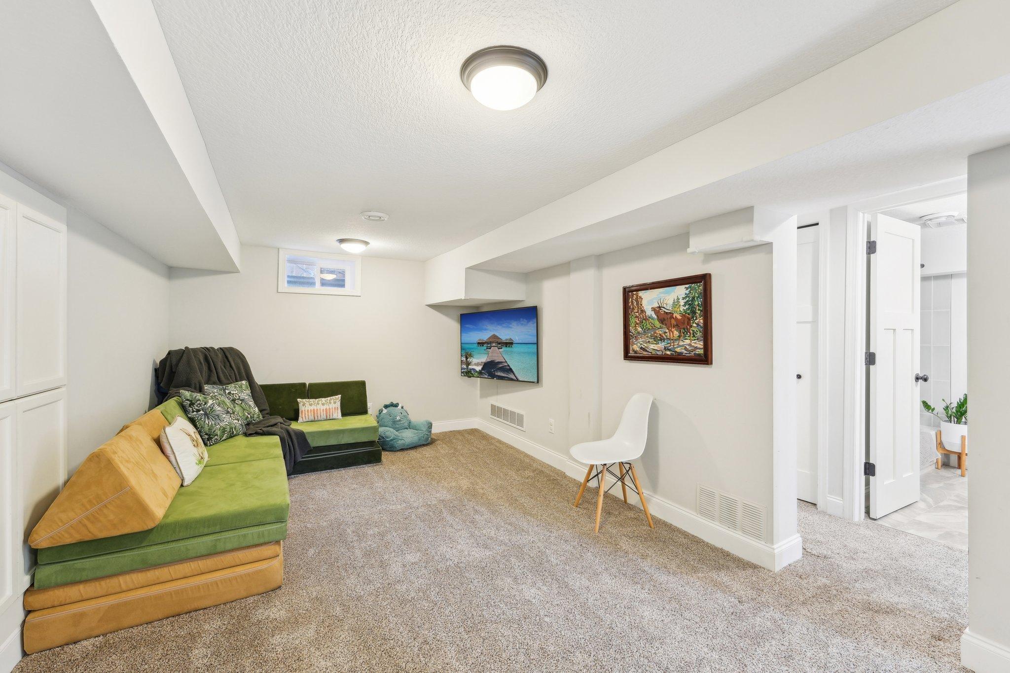 The family room can truly be utilized as separate living areas due to it's size. The seller's enjoyed this side as their casual TV room.