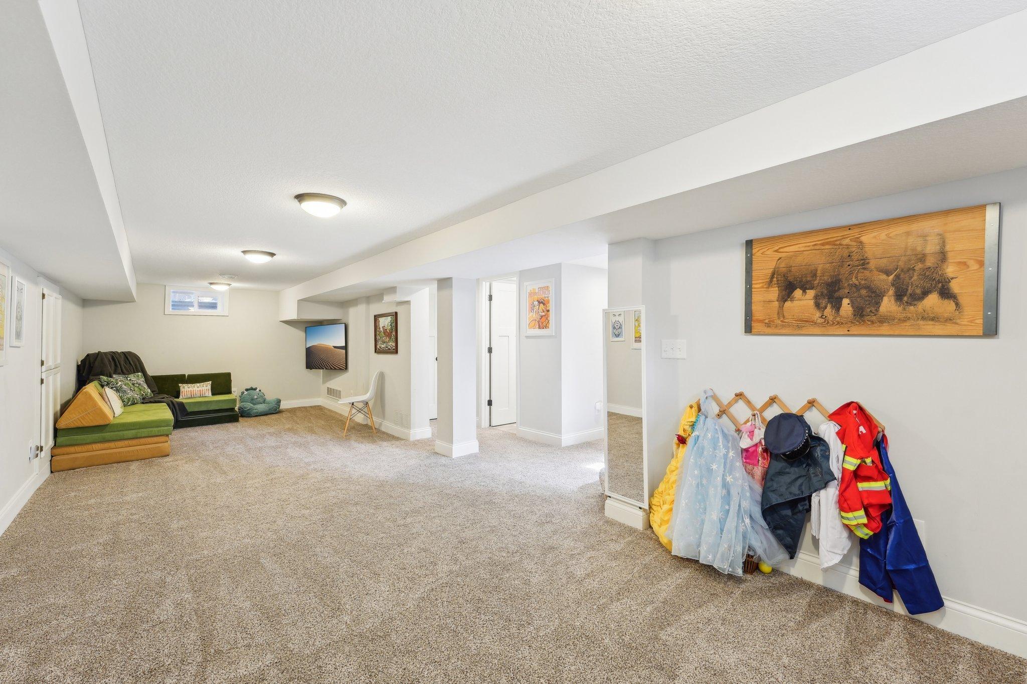 Downstairs you'll find a sprawling family room that spans over 29'!