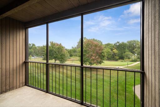 Step out onto your private screened balcony and be greeted by views of lush greenery--or pristine white :). This inviting outdoor space is perfect for sipping your morning coffee and enjoying the sunrise.