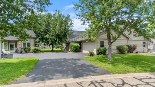 Enjoy One-Level Living with In-Floor Heat in a Prime River Falls Location!