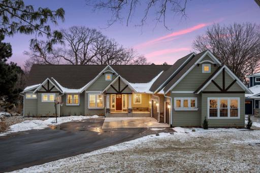 Welcome to luxury living on Lake Minnetonka! This custom, walkout rambler was built in 2023 and features tons of upgrades.