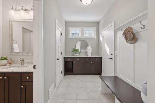 Walk right into the mudroom from the 3 car garage.