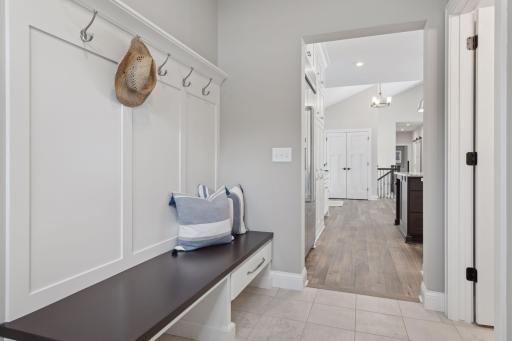 Fabulous storage space in the mudroom as you enter from the three car heated garage!