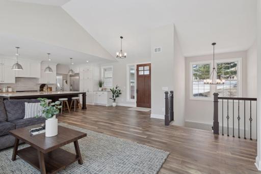 Spacious open concept main floor with oak floor throughout.