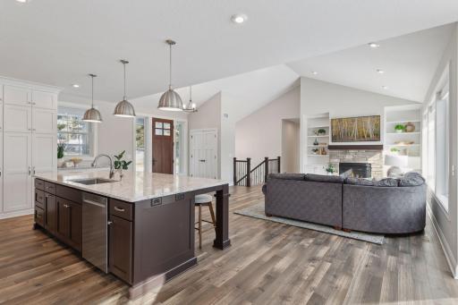 Custom design and luxury finishes throughout to include beautiful White Oak Wood Floors with a custom stain.