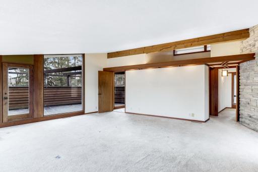 Primary bedroom has access to private balcony and 3/4 bathroom and walk-in closet.