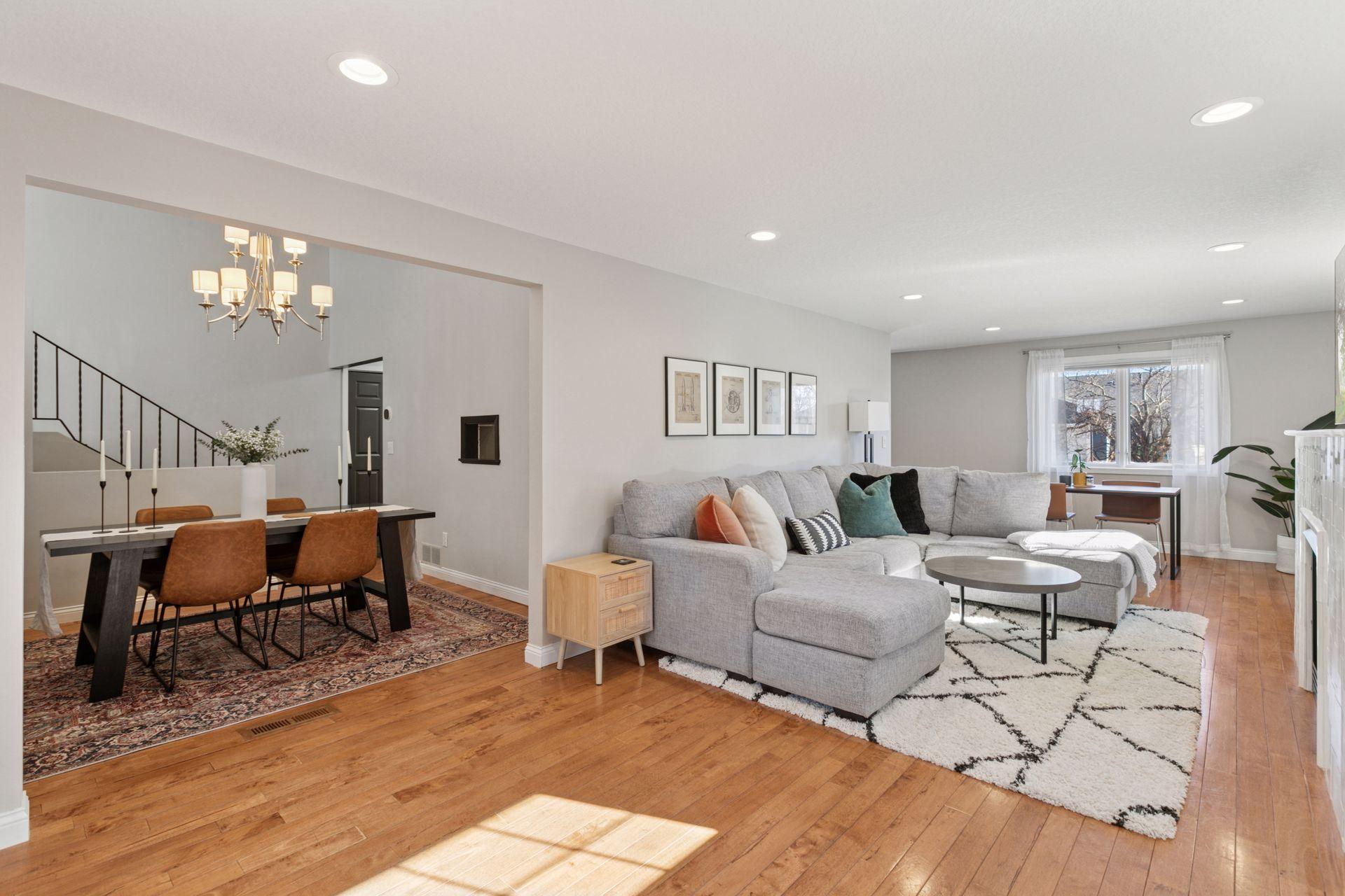 The main level living room and upper level living room both walk out to the pool