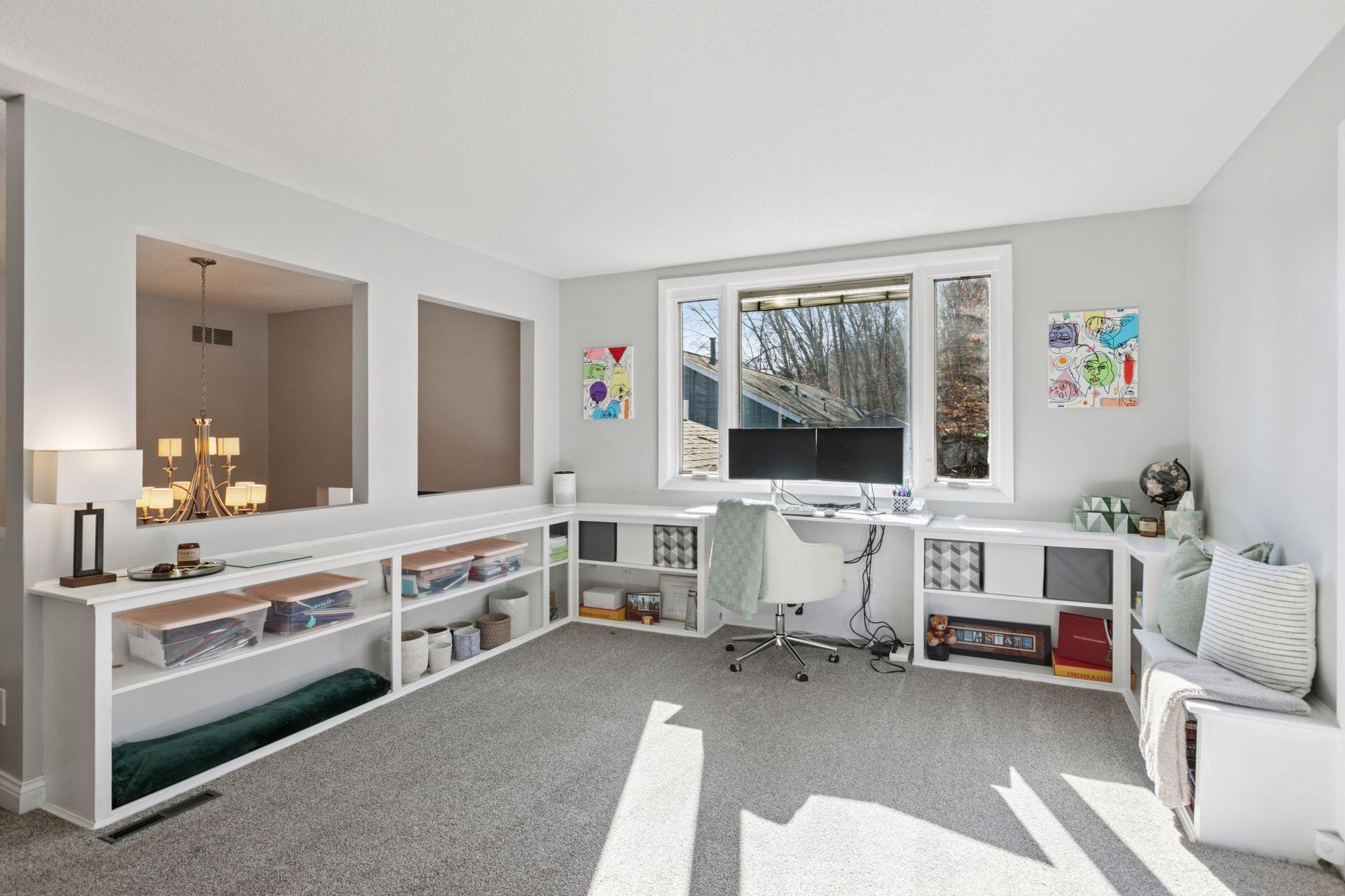 Upper living room overlooking the formal dining space