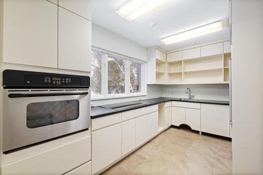 2nd entry from garage, back kitchen/mud room/future laundry?