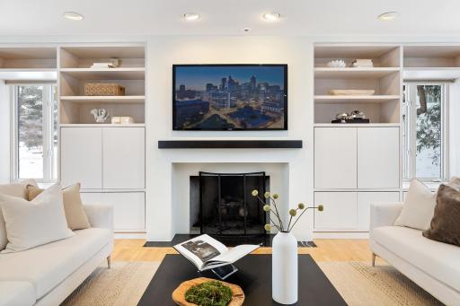 Great room fireplace and wall of built-ins