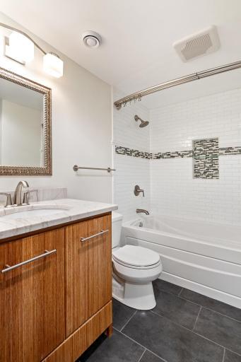 Lower level full bath, connected to main room and to 1 of 2 lower level bedrooms