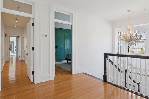 Beautiful upper level hall with 9'+ ceilings.