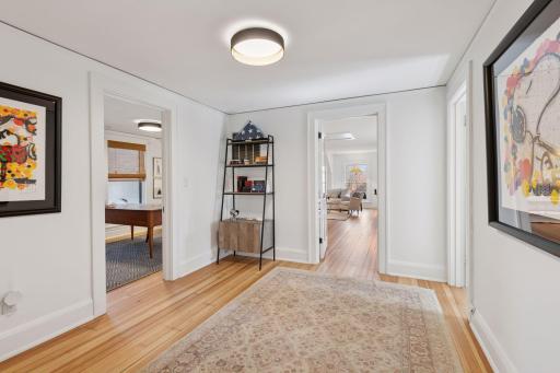Third floor center hall leads to the 4th and 5th bedrooms, a full bath, and a bonus/recreation room.
