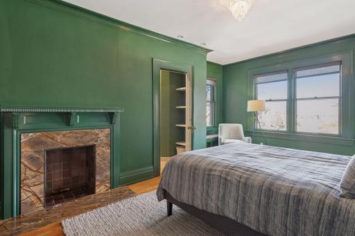 Third bedroom with 3/4 en suite bath, sitting area, and decorative fireplace (not functional.) Please note: 3rd bedroom does not have a dedicated closet.