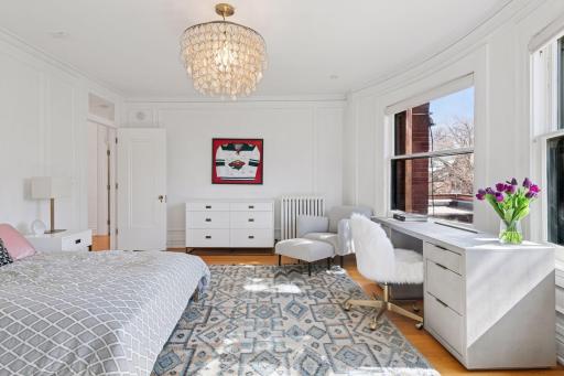 Second bedroom features southern exposure and garden views.