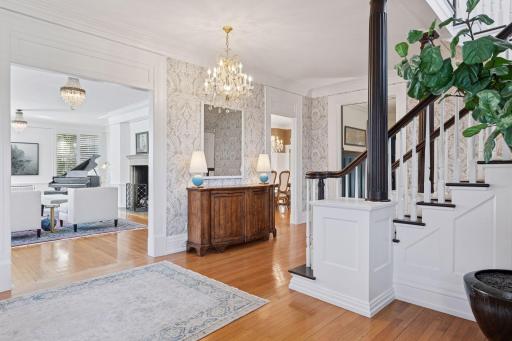 10' ceilings and large windows throughout the main level provide wonderful natural light. Gorgeous crown moulding and mill work throughout the home has been beautifully enameled and preserved.