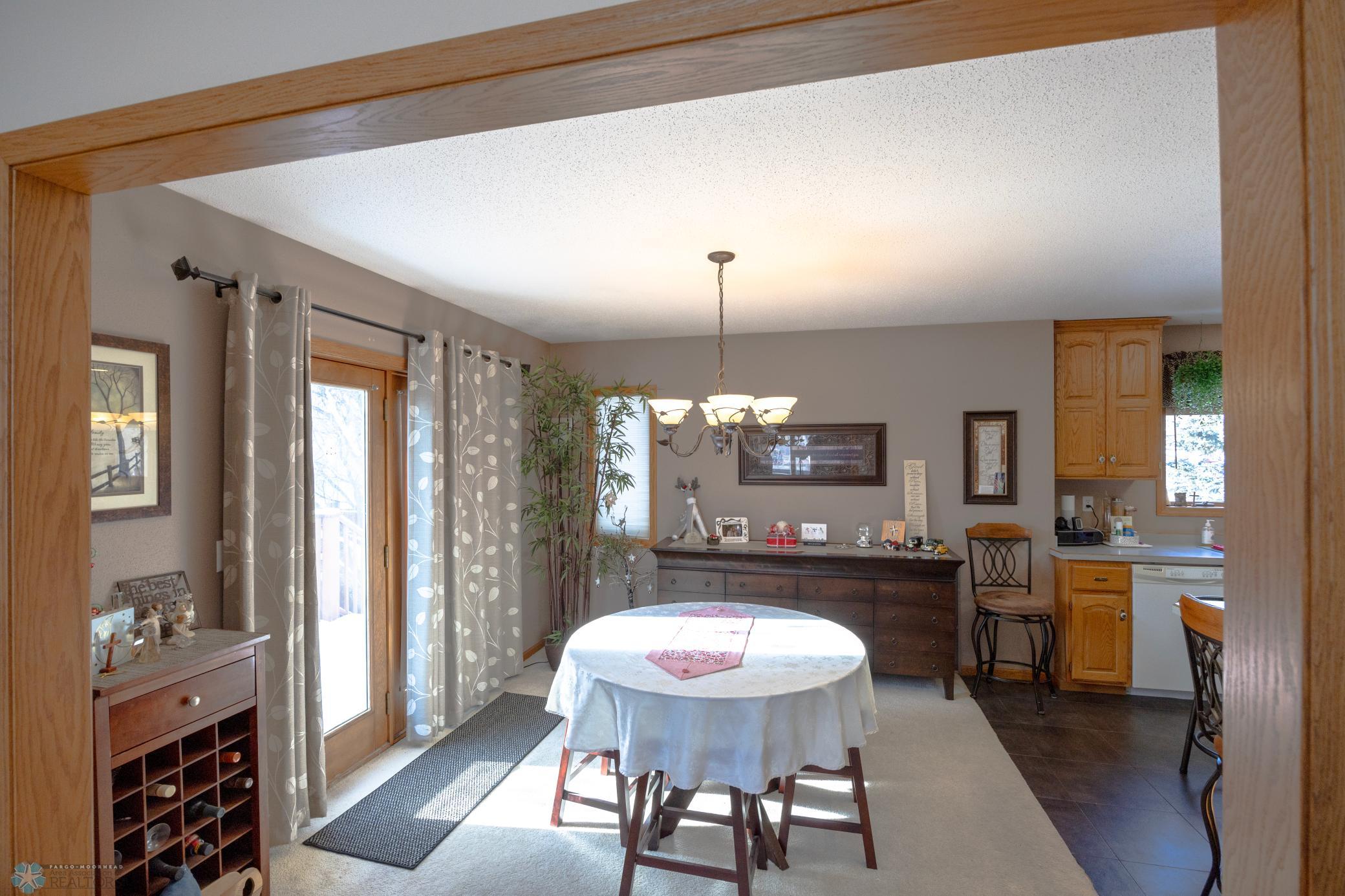 Dining Room w/ Doors to Deck