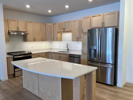 Step into this thoughtfully designed residence that seamlessly blends modern luxury with functional elegance.