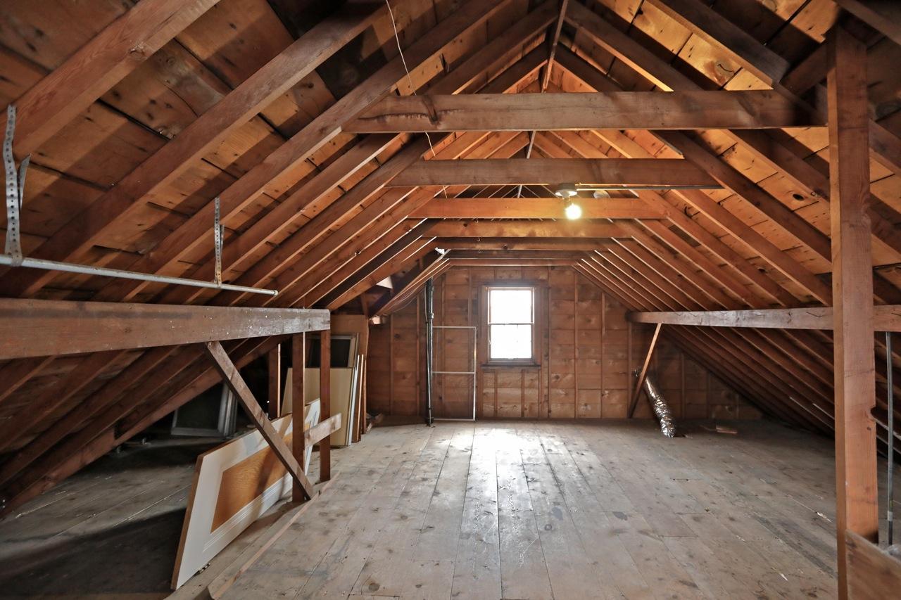 Large attic for additional storage, with the potential to add future finished living area