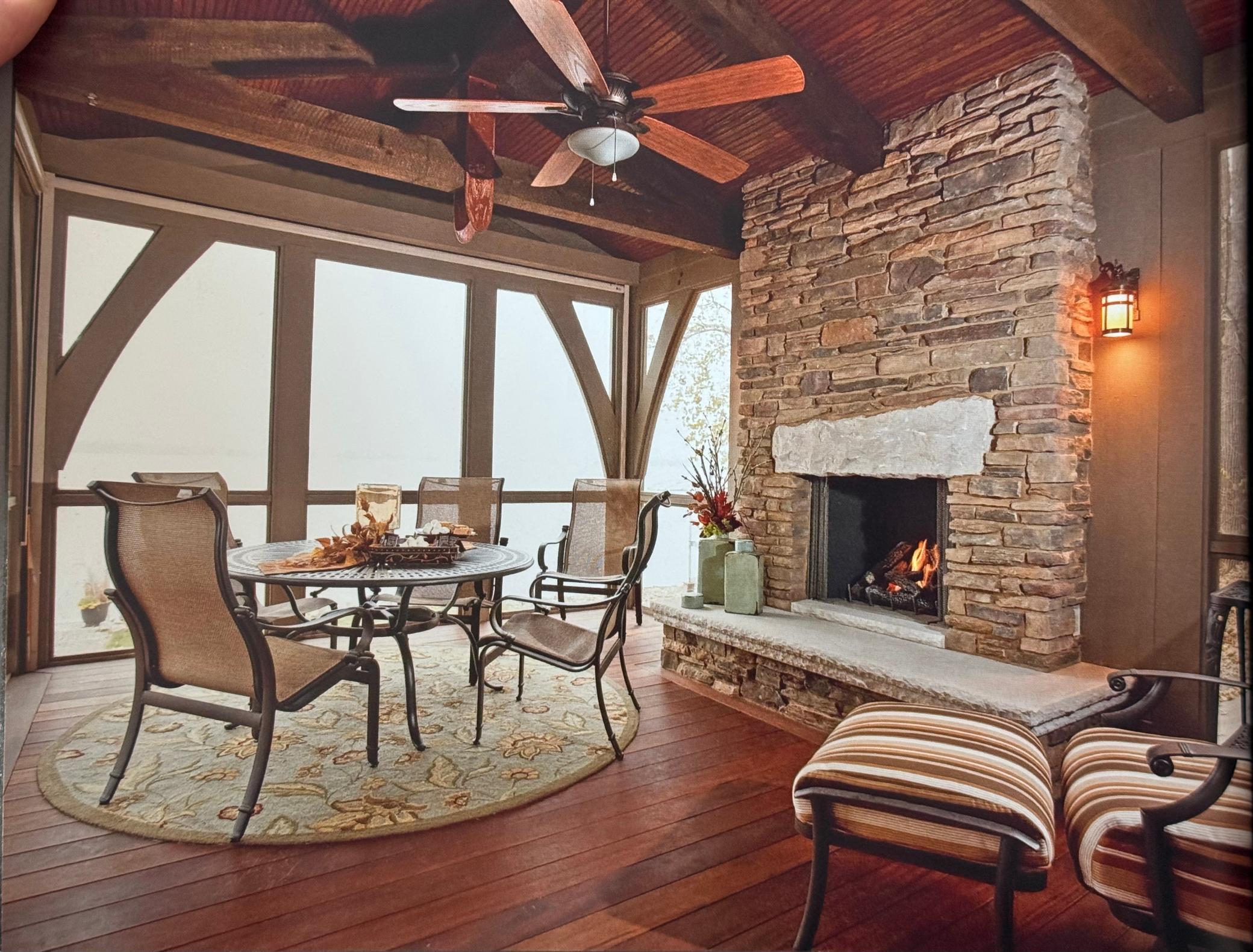 Having over the lake, the three season porch has impressive craftsmanship and amazing view.