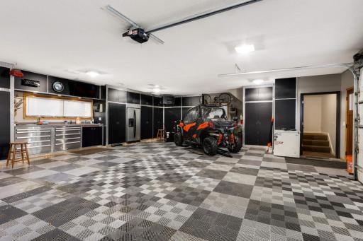 View of the fully finished garage - heated and fully plumbed. Drains in the finished floors too!