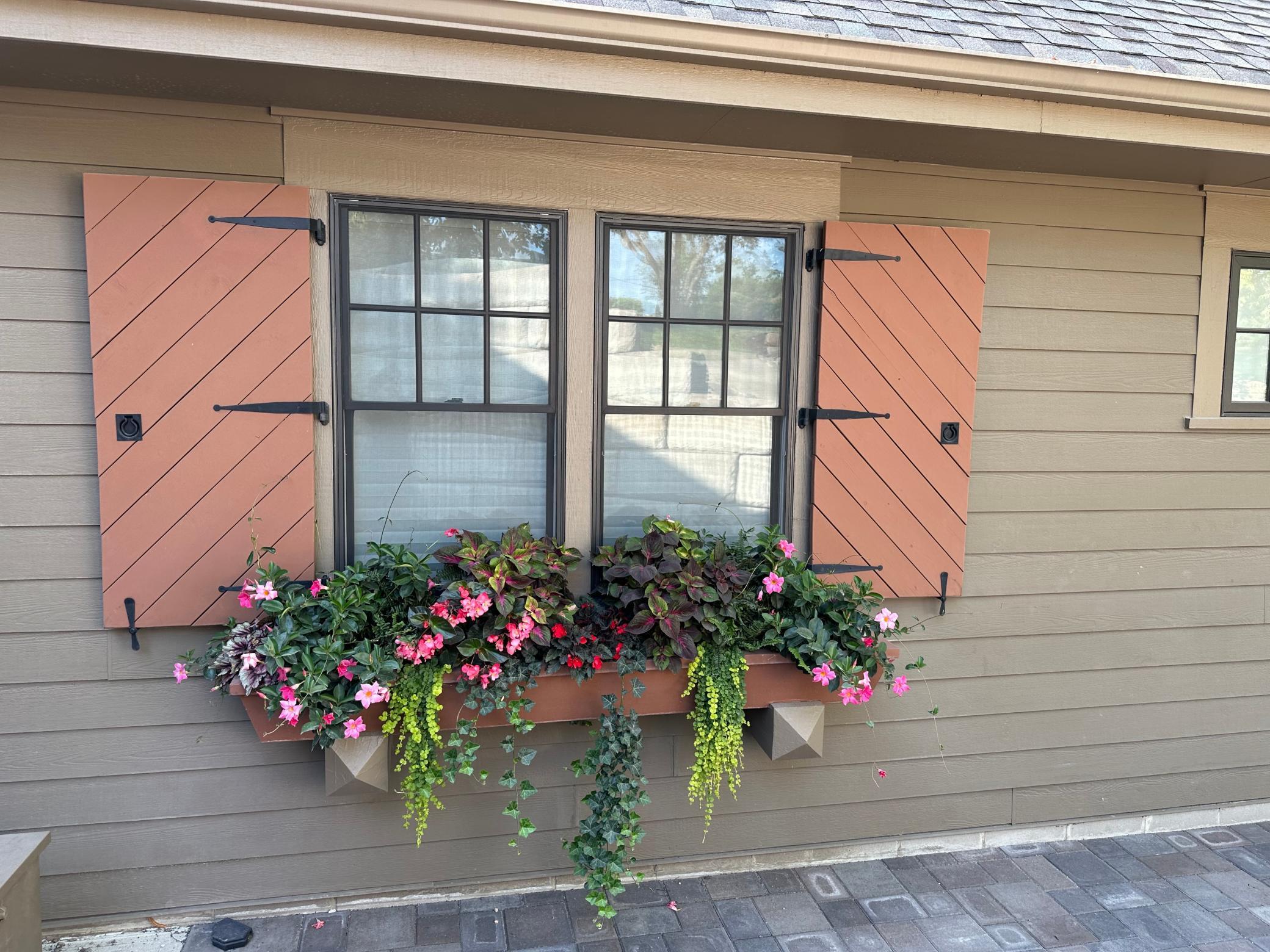 Flower boxes can be found around the property