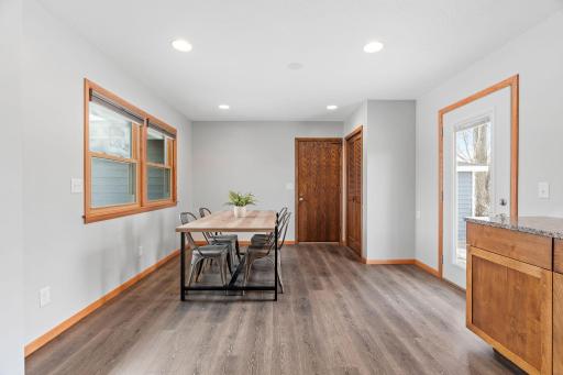 Laminate flooring throughout kitchen and patio door to fenced backyard.