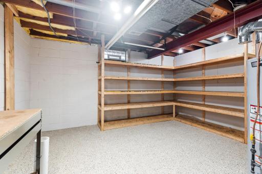 Fully epoxied flooring in laundry and storage.