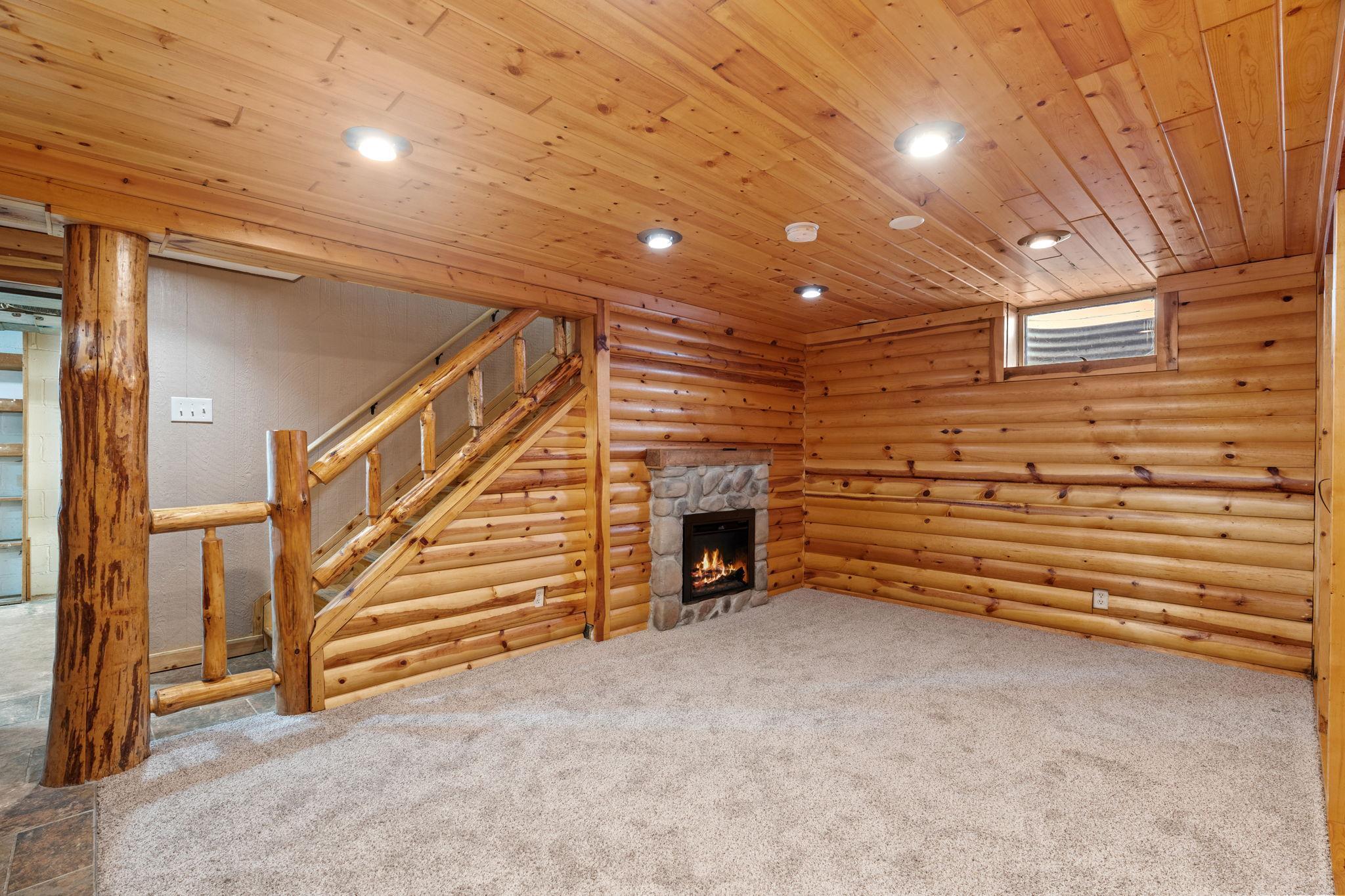 Lower level family room with fireplace.