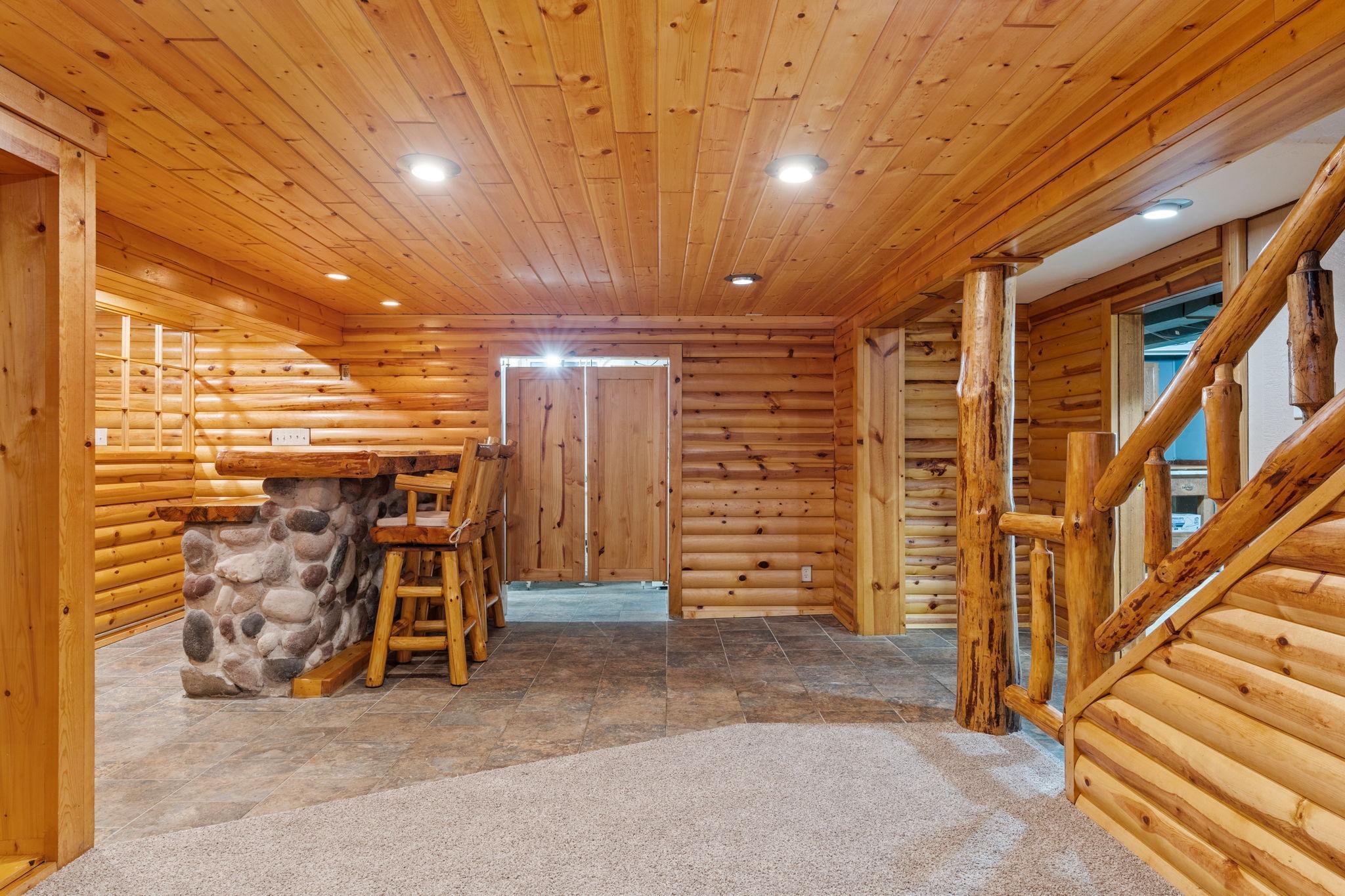 Lower level family room and bar/saloon.