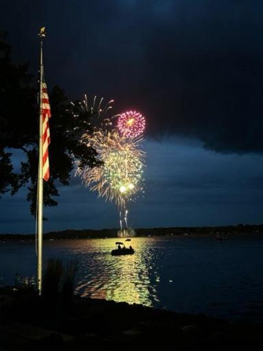 The Briggs Lake Chain has one of the more active lake associations you will find. They put on events year round such as this 4th of July fireworks display which happens to be directly in front of this home.