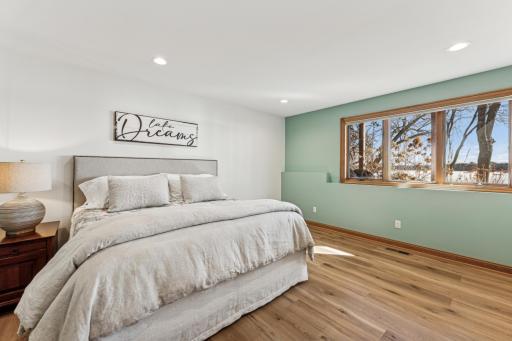 Here is a view of the fourth bedroom, also added in 2020, which overlooks the lake through the massive egress window.