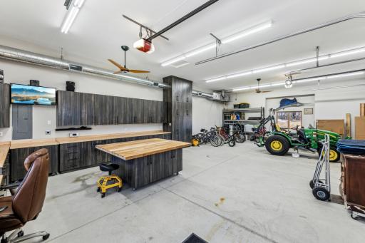 This incredible shop has endless possibilities. Classic cars, wood shop, it has its own furnace and duct-work so staying warm is a non issue.