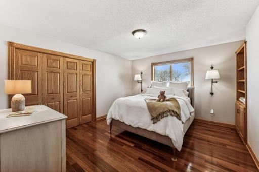 Here is the second of the three main floor bedrooms, situated just a bit outside of the primary bedroom.