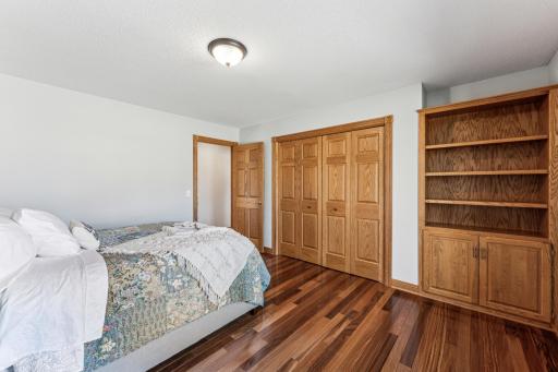 Here is the third of the three main floor bedroom, this one features great closet space as well as custom built ins.
