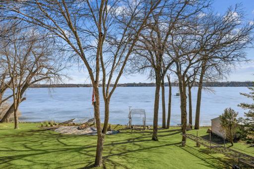 Gorgeous slow sloping yard down to the sandy beach with east facing views.