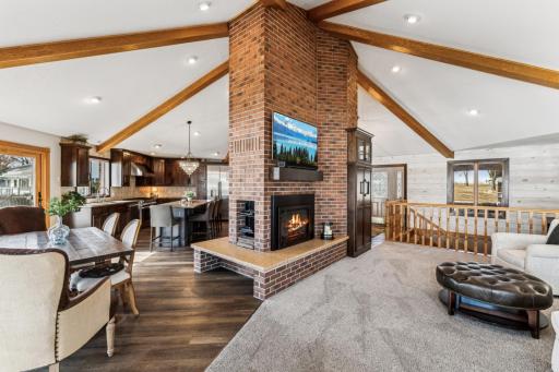 Great view looking back towards the fireplace showing the vaulted ceilings and open concept layout of the home.
