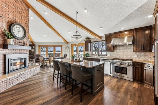 Completely remodeled kitchen featuring Cambria granite countertops and stainless Thermador appliances with new cabinets and flooring as well.