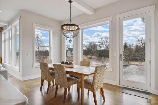 The informal dining room / eat in kitchen is a bright and cheery.