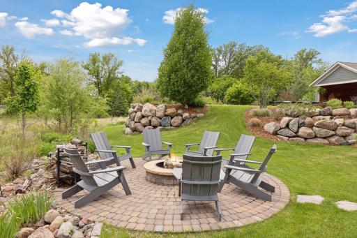 Relax with your favorite beverage around the cozy firepit.