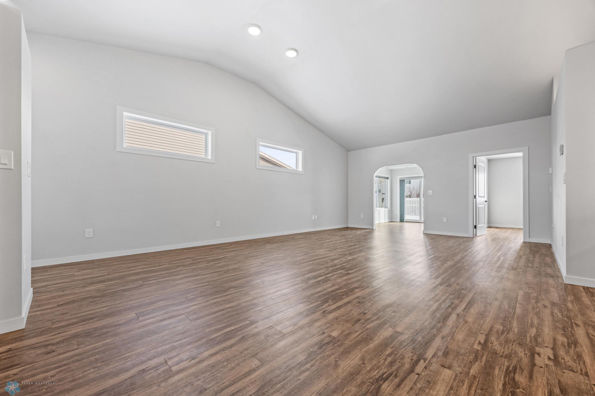 Hard-surface floors with minimal transitions, cathedral ceilings, transom windows