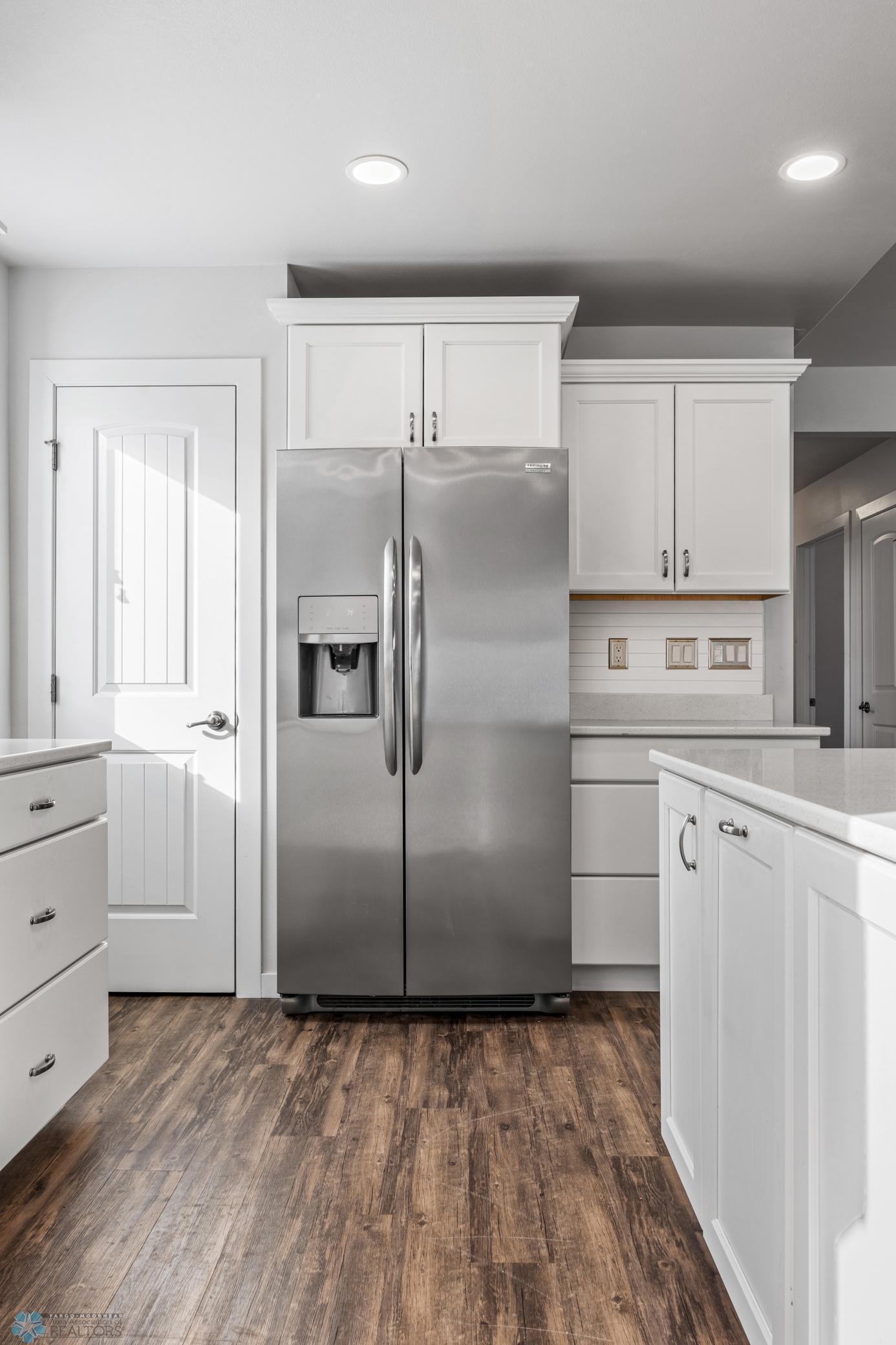 *Digitally Altered Backsplash* Kitchen currently has tile - Seller will shiplap (similar to as shown) at buyers request.