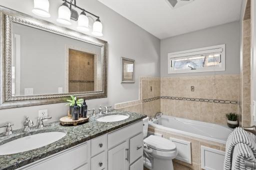 Primary full bathroom, shower, bath double sinks