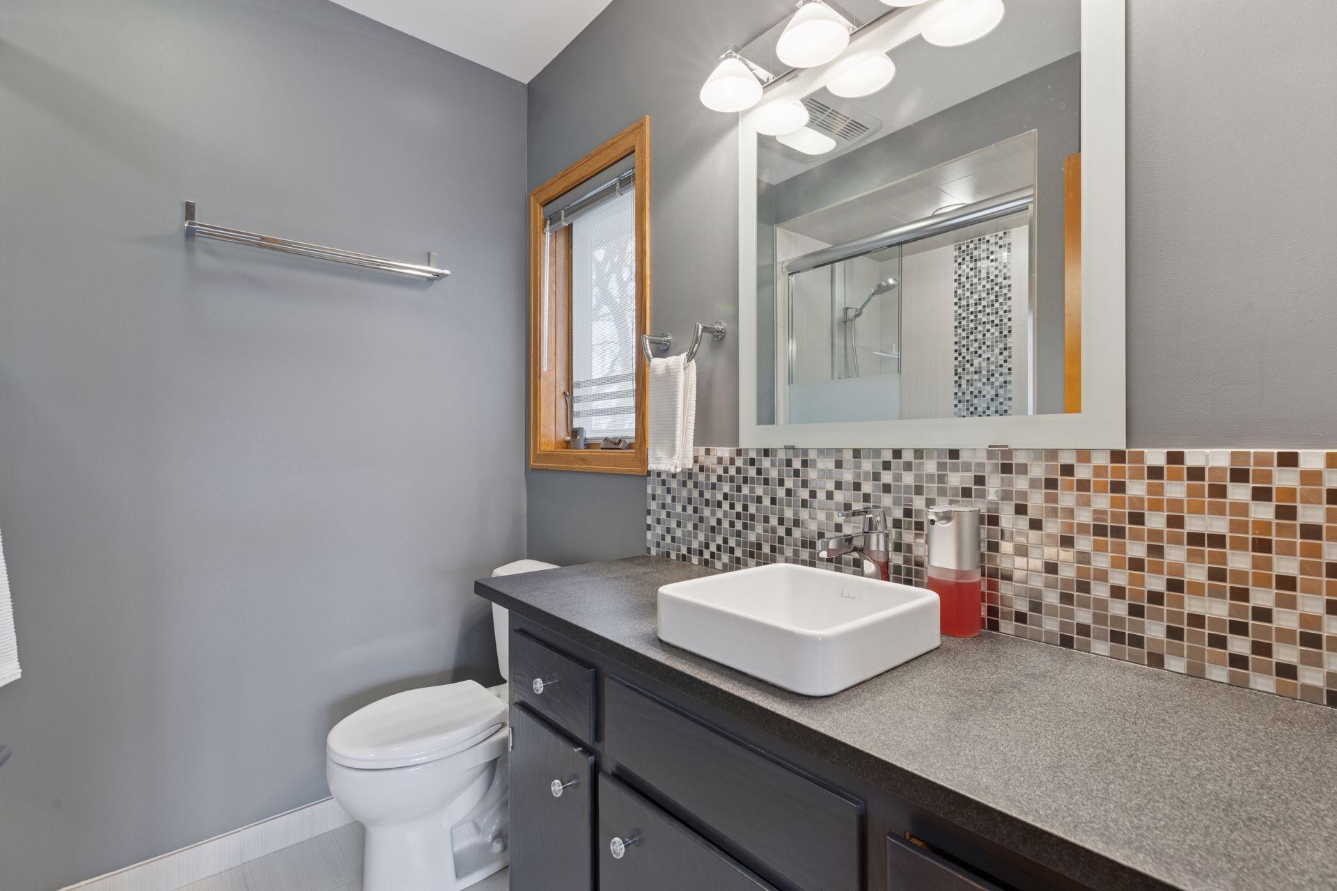 Upper level, primary suite bathroom