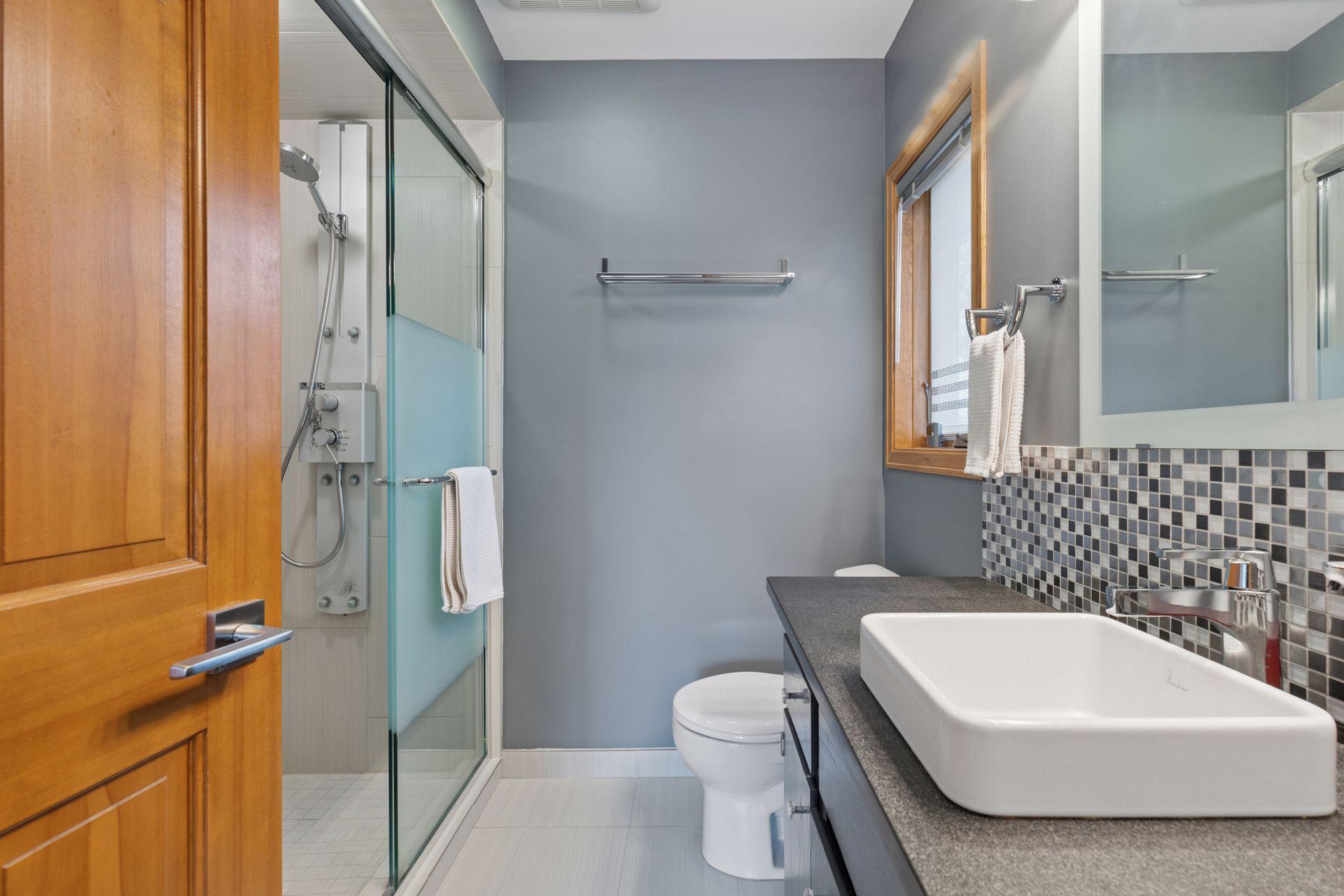 Upper level, primary suite bathroom