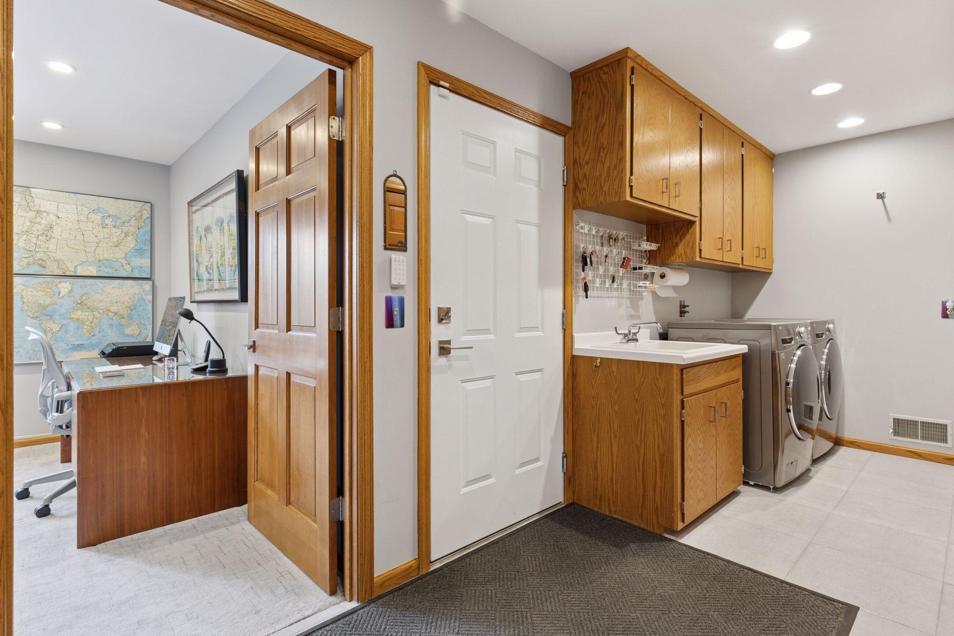 Main floor laundry space, off the garage.