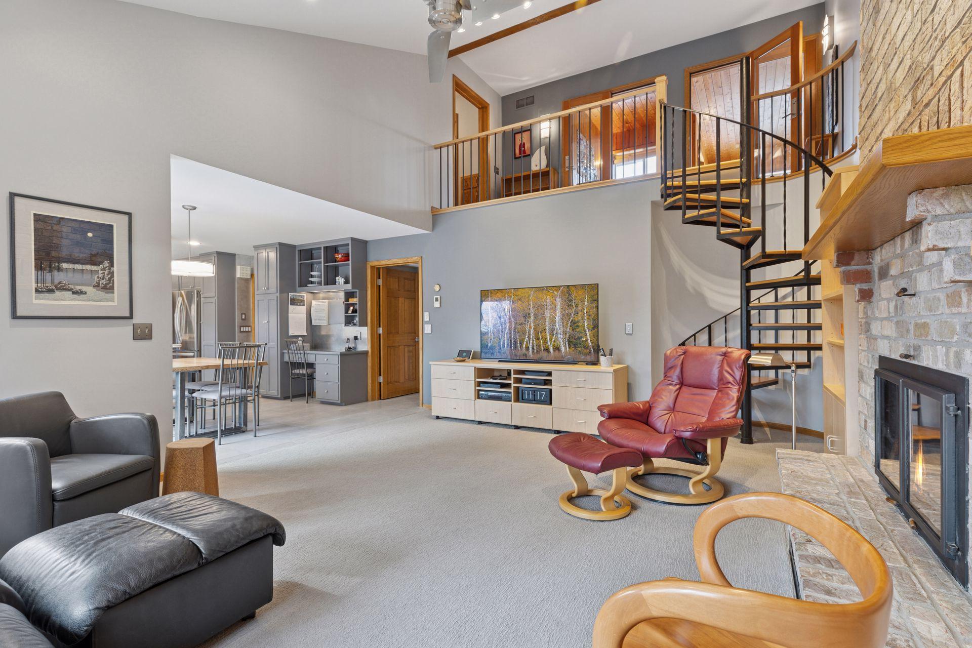 A spiral staircase from the family room leads to a charming three-season porch.