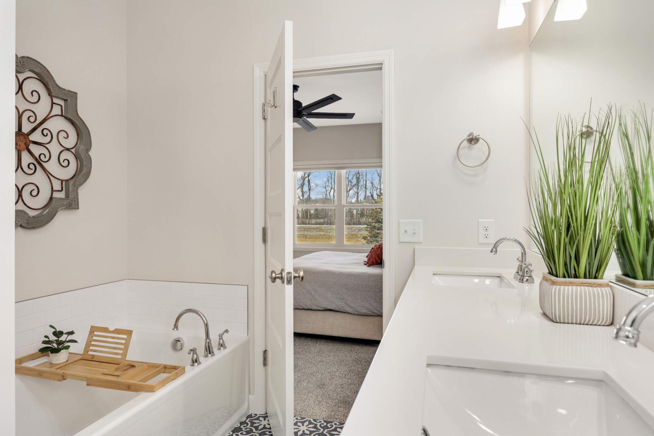 Spacious shower, soaking tub, and dual vanities, it provides the perfect setting for relaxation and rejuvenation