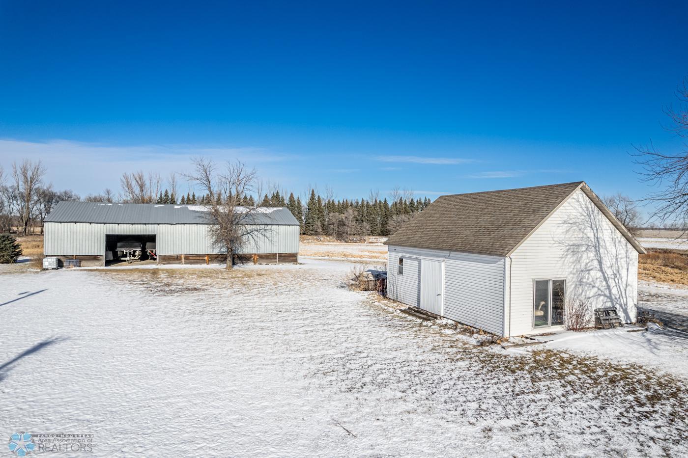 Pictured: 2 of 5 outbuildings
