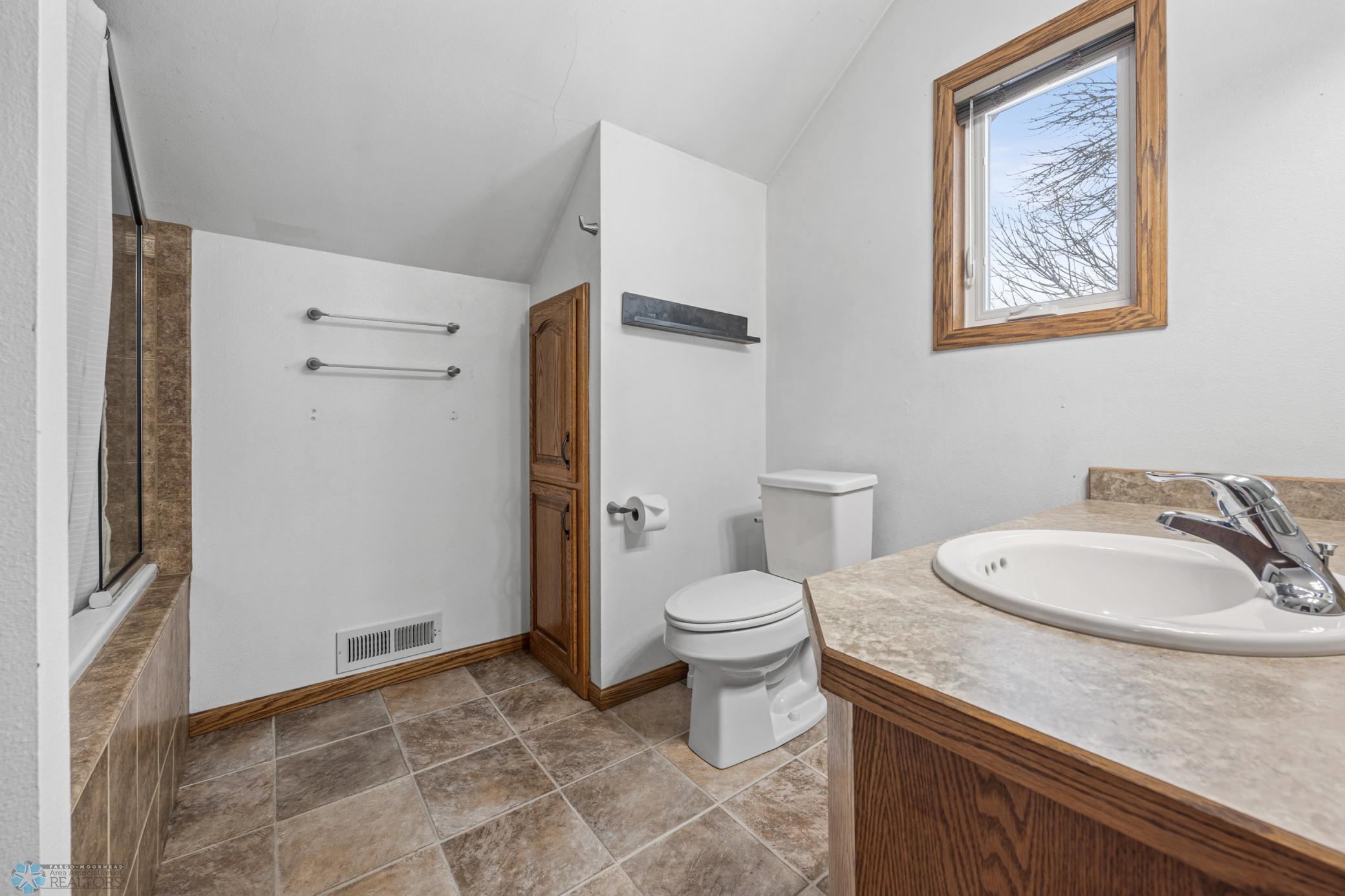 Upstairs Full Bath, with tile shower